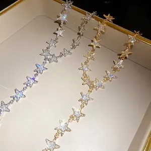 Collier choker étoile en strass étincelants fini or et argent