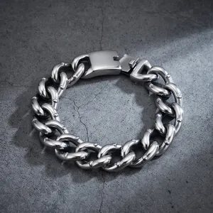 Close-up of heavy 18mm stainless steel Cuban link bracelet with rivet details
