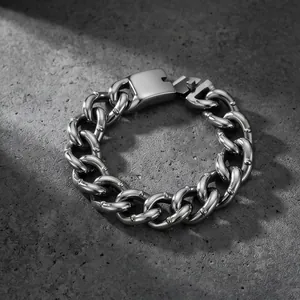 Detailed close-up view of 18mm heavy stainless steel Cuban link bracelet with studs
