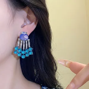 Vintage silver needle oval resin stud earrings with rhinestone tassels and blue beads