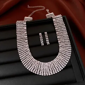 Luxurious multi-row rhinestone fringe necklace and earring set for gala events
