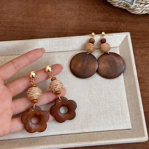 Retro ethnic style wooden geometric drop earrings with woven beads and flower charms