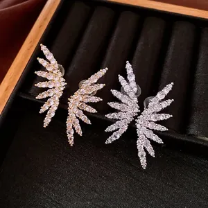 Elegant 18k gold plated wing ear clips with shimmering cubic zirconia stones for women