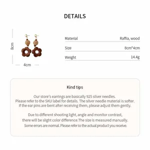 Detailed size and material info for vintage wooden and raffia floral drop earrings.