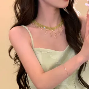 Beautiful model wearing a sweet Mori style handmade green beaded flower choker necklace