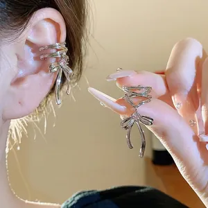 Elegant silver bow knot ear cuff with sparkling pink zirconia for non-pierced ears