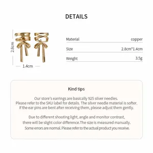 Detailed product view of a gold bow-knot ear cuff showing material and dimensions