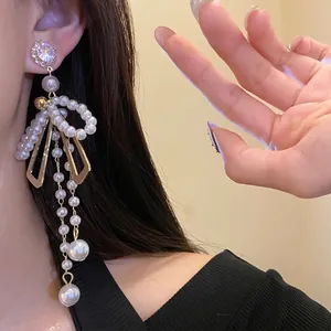 Elegant French retro long pearl tassel bow earrings with sparkling rhinestone studs
