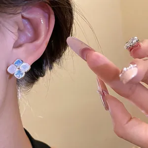 Elegant silver needle resin rhombus stud earrings in light blue and white finish