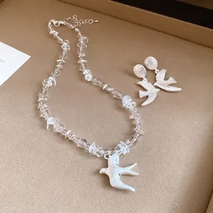 Minimalist crystal bead necklace with silver swallow pendant and matching earring set