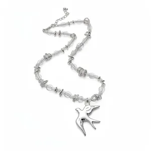 Minimalist crystal beaded necklace with a brushed silver swallow pendant for women