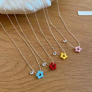 Colorful zirconia flower necklaces in blue, red, yellow, and pink styles