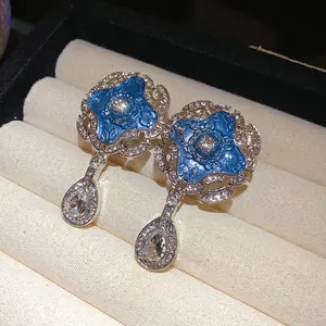 Vintage royal blue enamel flower earrings with sparkling teardrop crystals for women