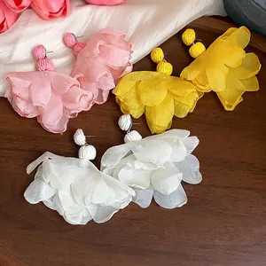Three pairs of elegant bohemian chiffon flower stud earrings in pink yellow and white