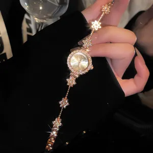 Elegant vintage rose gold flower bracelet watch with sparkling rhinestones for women