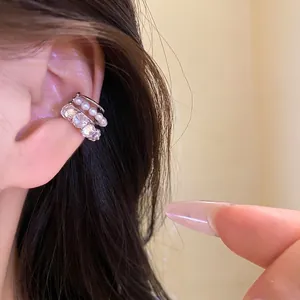 Elegant silver-toned ear cuff with sparkling zircons and white pearls for non-pierced ears