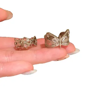 Vintage style zircon butterfly open rings for women with intricate filigree designs.