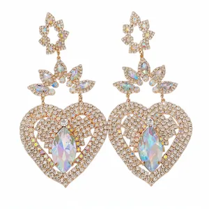Luxurious gold heart-shaped drop earrings with floral accents and colorful crystals