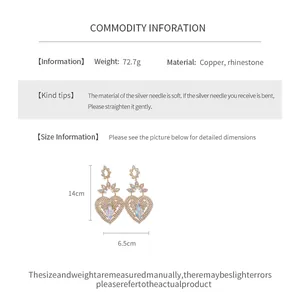 Detailed dimensions and material information for vintage heart rhinestone drop earrings.