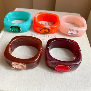 Collection of colorful square resin bracelets with large centered gemstones