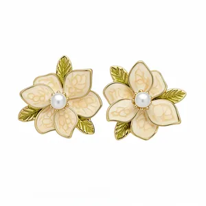 French style flower stud earrings with elegant cream enamel and white pearl accent