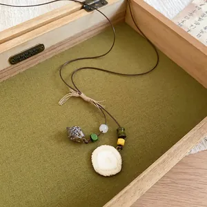 Vintage Zen style acorn pendant necklace with natural wood slice and colorful beads