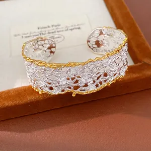 Elegant French vintage lace hollow cuff bracelet in two-tone silver and gold finish.