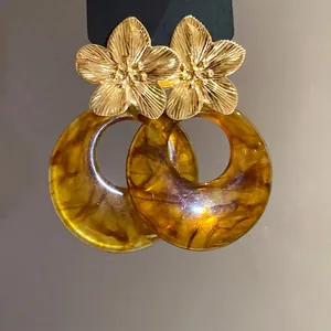 Elegant vintage gold flower earrings with amber resin hoop pendants and silver needles
