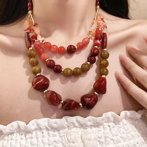 Vintage multi-layer beaded necklace with earthy agate-style resin beads and gold detail