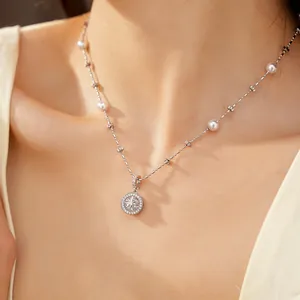 Elegant close-up of a silver zircon eight-pointed star pendant necklace on a woman's neck.