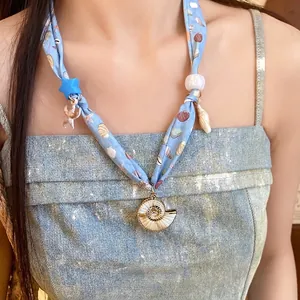 Summer ocean style silk scarf necklace with shell and starfish charms for beach vacation