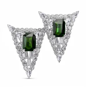 Elegant emerald-cut green stone triangle stud earrings with sparkling crystals on white background