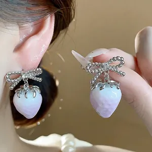 Sweet resin strawberry stud earrings with shimmering silver bowknot and zircon accents