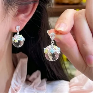 Elegant dopamine-style drop earrings with colorful enamel flowers and clear resin balls.