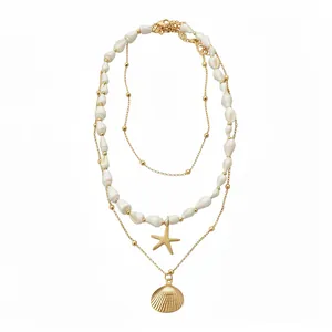 Elegant three-layer beach style necklace set featuring starfish and seashell gold pendants