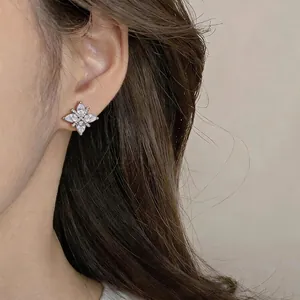 Elegant cubic zirconia flower ear clip for non-pierced ears in a sweet Korean style.