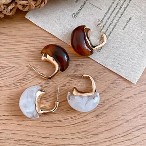 Vintage Maillard style C-shaped resin hoop earrings with elegant gold-tone metal studs