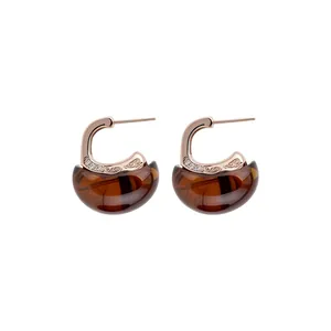 Elegant C-shaped drop earrings featuring brown resin and crystal rose gold finish