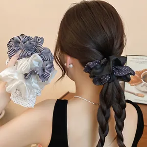 Double-layer hair scrunchie with elegant polka dots and stripes for ponytail styling