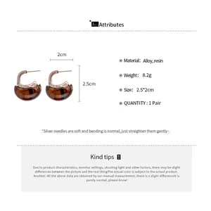 Detailed specifications for vintage brown C-shaped resin earrings with alloy posts.