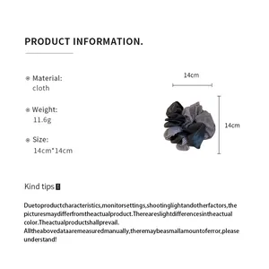 Detailed technical specifications for the striped fabric scrunchie showing 14cm dimensions.
