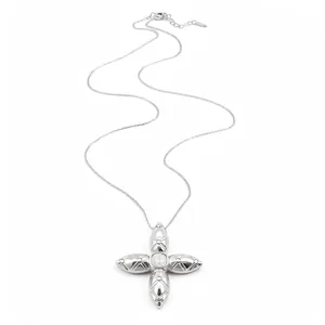 Elegant silver cross pendant necklace featuring a square diamond and quilted pattern design
