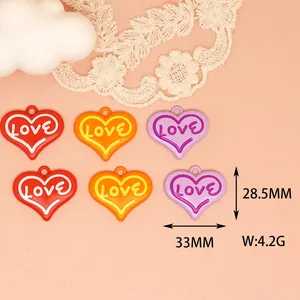 Detailed view of colorful heart-shaped LOVE charms for DIY jewelry making with dimensions