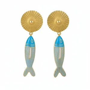 Vintage gold-tone fish drop earrings with blue enamel and ethnic textured disks.