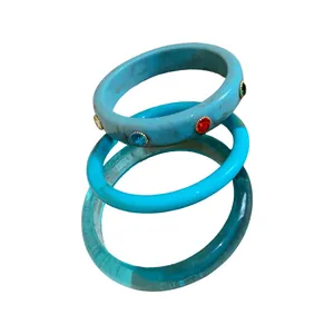 Set of three stackable colorful resin bangles with multicolored rhinestone accents for women