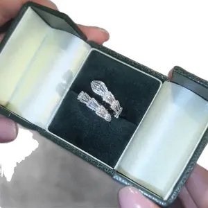 Elegant snake-shaped adjustable silver ring with sparkling cubic zirconia in gift box