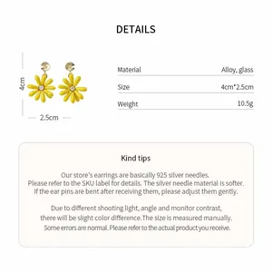Detail chart of yellow daisy earrings showing alloy and glass material specifications.