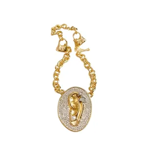 Statement gold chain necklace with zircon paved oval ear pendant and elegant pearl accent