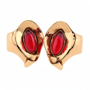 Orecchini a perno vintage color oro con intarsi in resina rossa a forma ovale unica