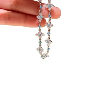 Elegant zircon flower bracelet with turquoise beads and delicate clover leaf motifs for women